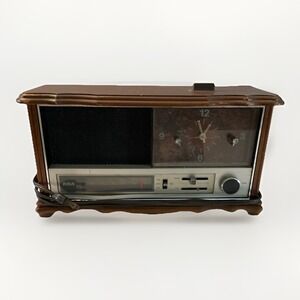 Vintage 1970 RCA AM FM Radio Alarm Clock Model RWS 494F Fruit Wood Finish